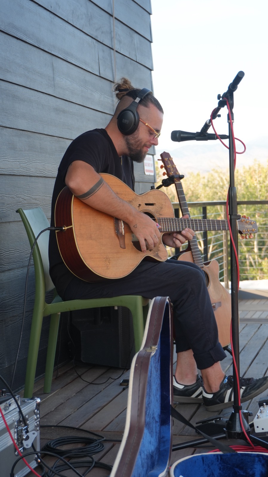 Live acoustic music on the Descanso patio at golden hour.