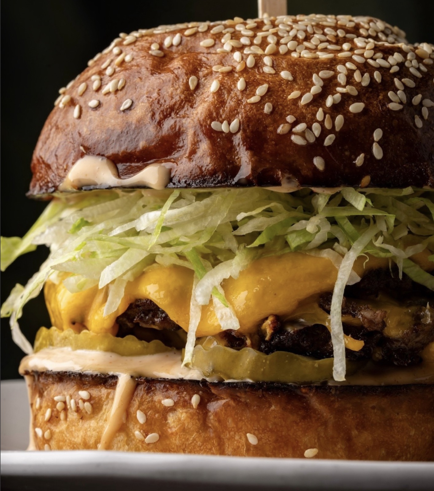 A stacked smashburger from Ground Rules.